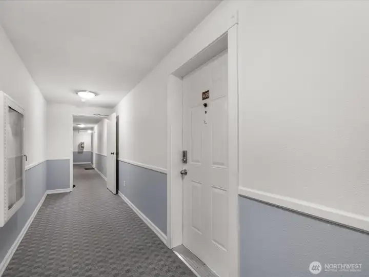 Tucked in towards the end of the hall, you are home.