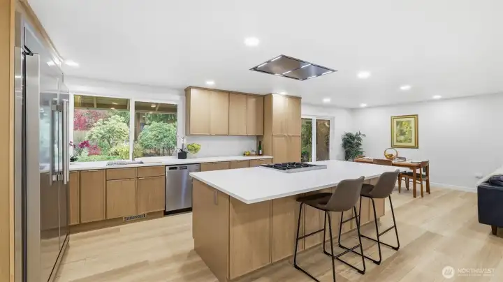 The kitchen delivers both function and style with quartz countertops. The kitchen delivers both function and style with quartz countertops.