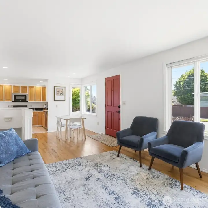 *virtual staging* Living room is open to dining area and kitchen