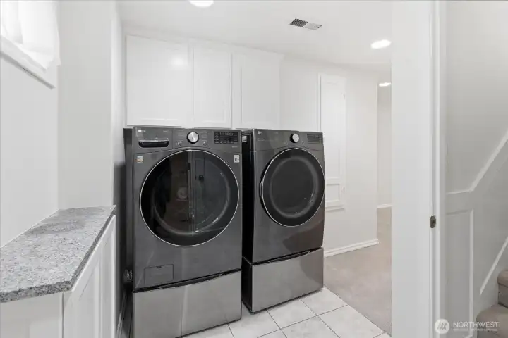 Laundry area in finished basement