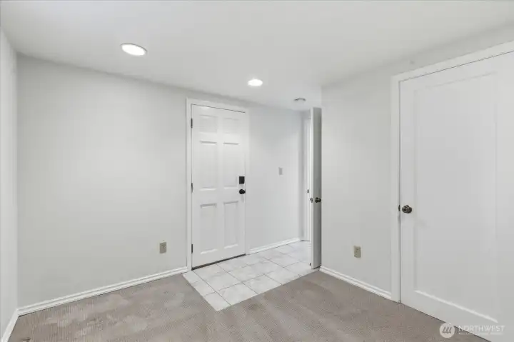 Lower level bedroom #2 with exterior door, separate access.