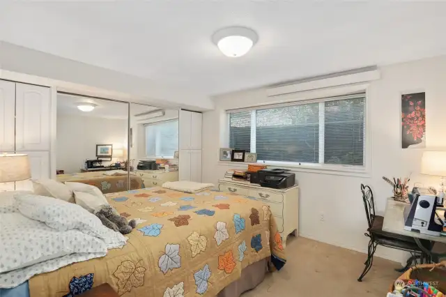 Surprisingly spacious, this bedroom offers ample room.