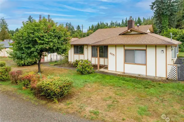 This charming ranch-style home located in peaceful Shelton residential neighborhood offers a welcoming front yard and mature trees, nestled on a spacious lot.