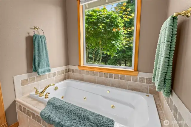 Full bathroom in the master with a separate soaking tub!