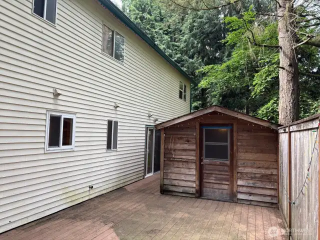 BAck deck accessed off the ADU with outdoor shed.