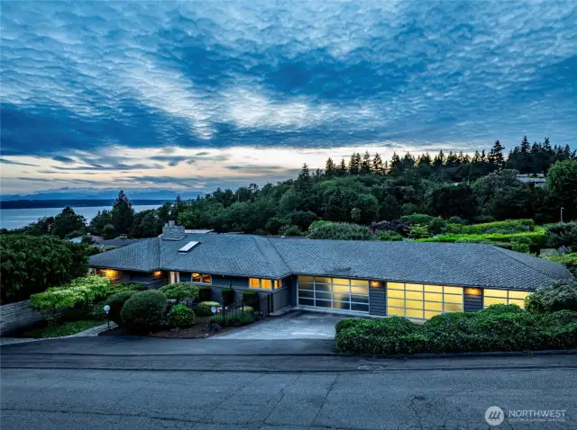 Welcome to this beautifully updated home on a quiet Innis Arden street overlooking the Puget Sound.
