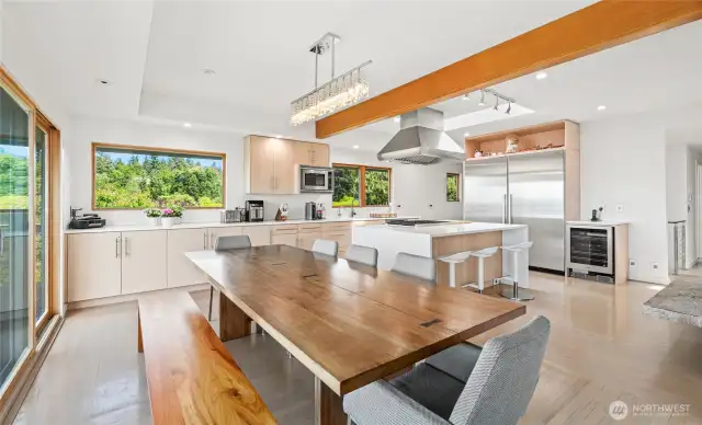Looking across the dining area toward the kitchen.