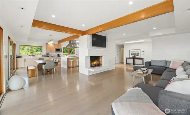 The open floor plan living areas and stunning oak flooring.
