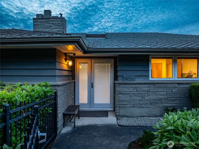 The home features a tastefully-designed gated front entry.
