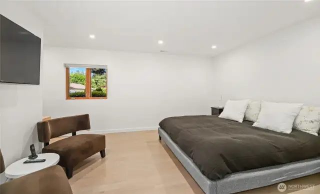 The large bedroom on the lower level with its own ensuite bath.