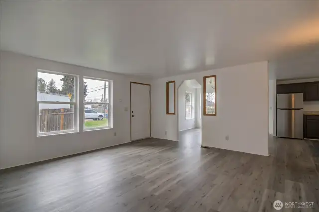 Spacious living with access to Dining Room and Kitchen.