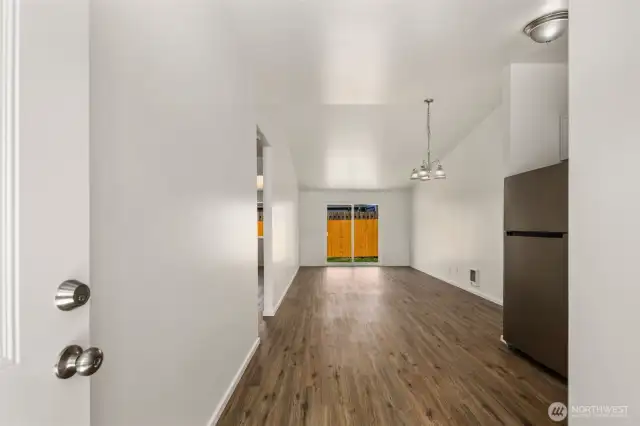 Unit B (on the right) with vaulted ceilings and vinyl wood plank flooring throughout!