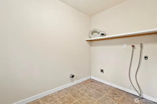 Laundry area next to "bonus room"