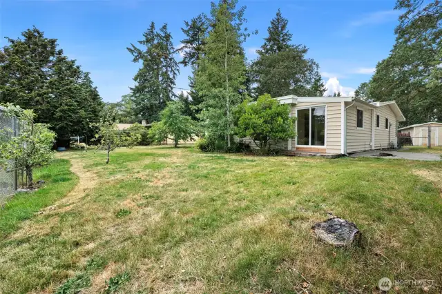 A gardener’s dream, the generous yard space surrounding the home invites creativity