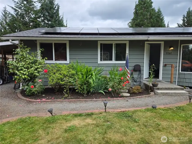 Walkways from both sides of the home to the front door.  Each side of the home provide for 1 covered parking and 4 uncovered parking spots.