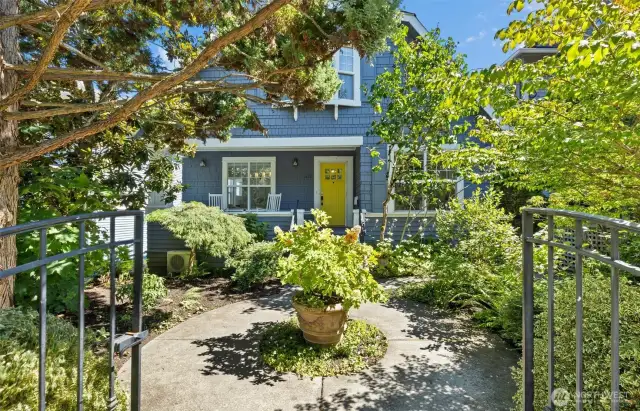 Welcoming front patio and rocking-chair front porch.