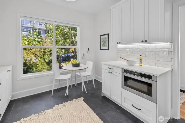 Coffee bar with breakfast table options.