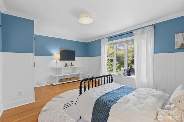This is a large bedroom.