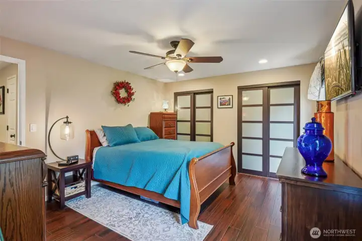 Primary with ceiling fan.