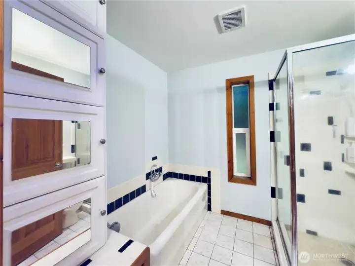 Large Bathroom: builtin, bathtub, tile, shower