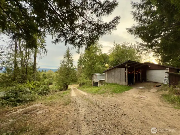 36x40 shop with an one bedroom ADU, other outbuildings and fencing