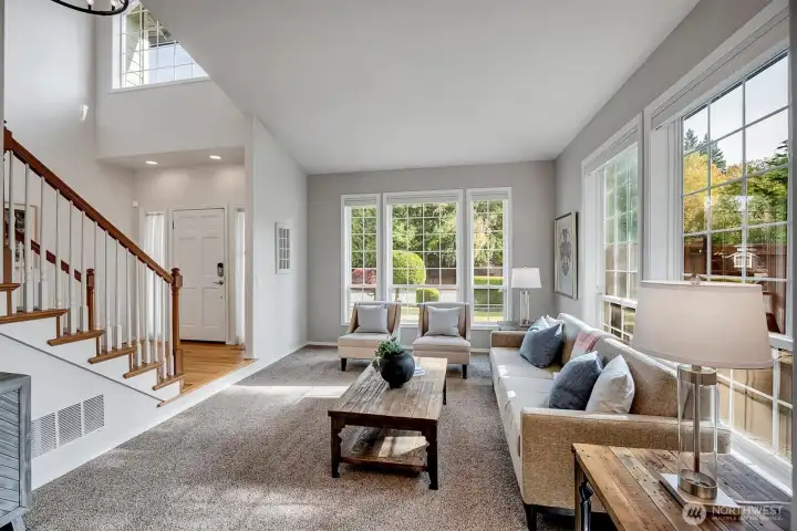 Walk in to large Living Room. Large windows bring in tons of light.