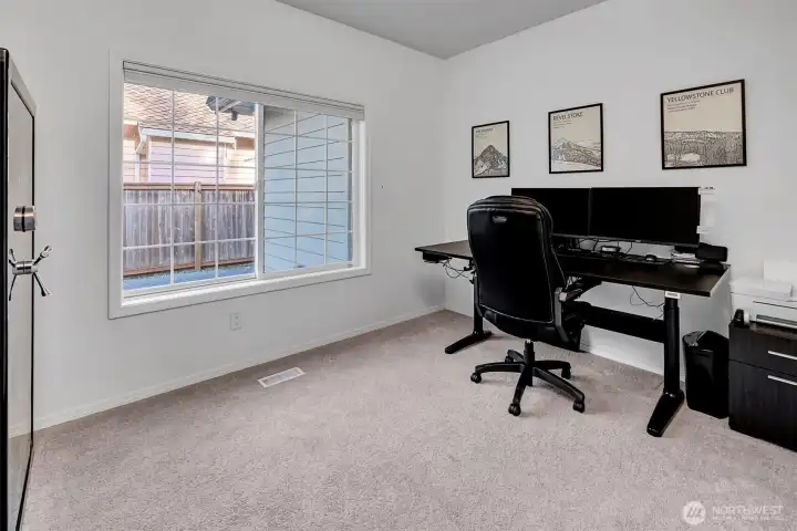 Main floor bedroom staged a Office- flexible to your needs.