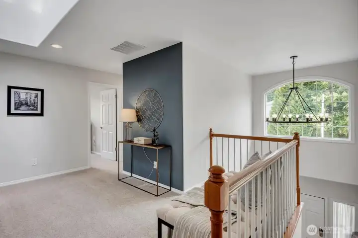 Large hall landing. Roomy enough for play/work space.