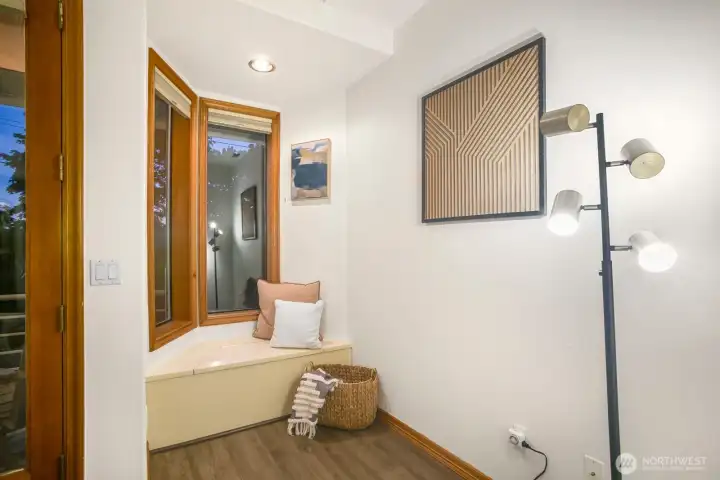 The cozy nook is a great place to read, relax or work.