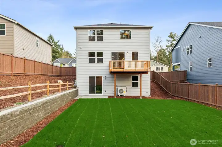 Expansice rear yard.  Imagine a beautiful garden with water feature above split rail.