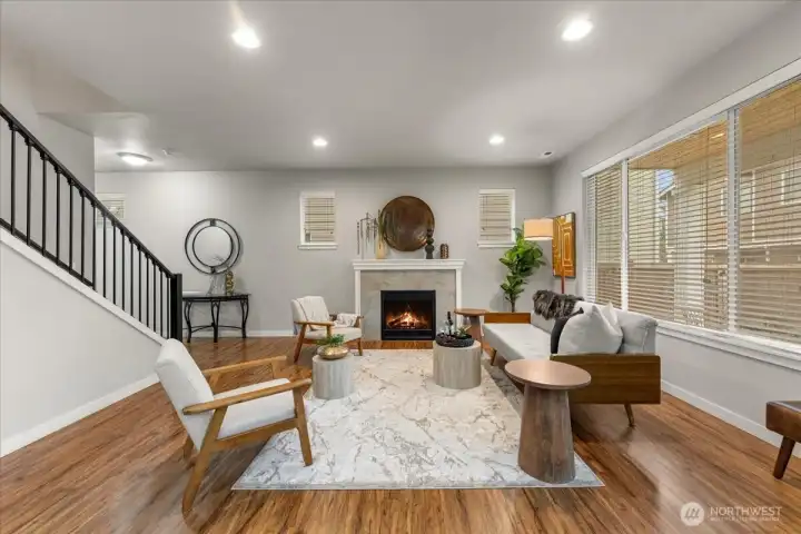 Spacious great room featuring a cozy gas fireplace and seamless flow for everyday living and entertaining.