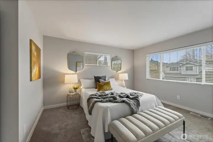 Spacious primary suite designed for comfort and relaxation.