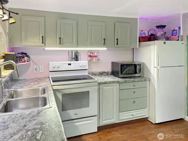 Kitchen with newer appliances.