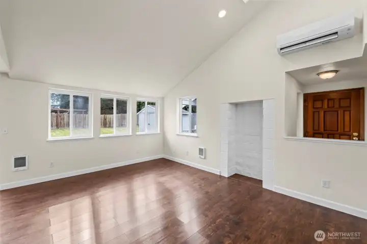 Living area with vaulted ceilings