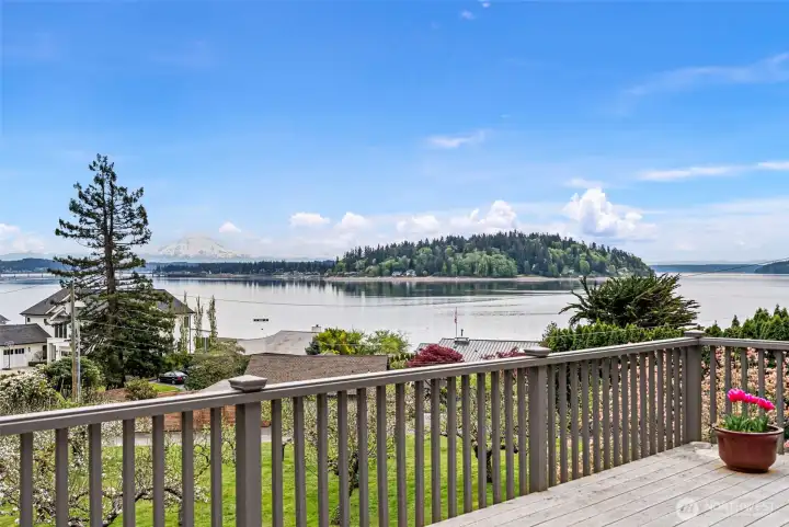 Mt. Rainier in all her glory can be viewed from the expansive deck of this lovely home.
