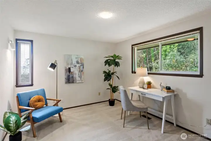 This main level room is currently used as an office and also includes a closet.