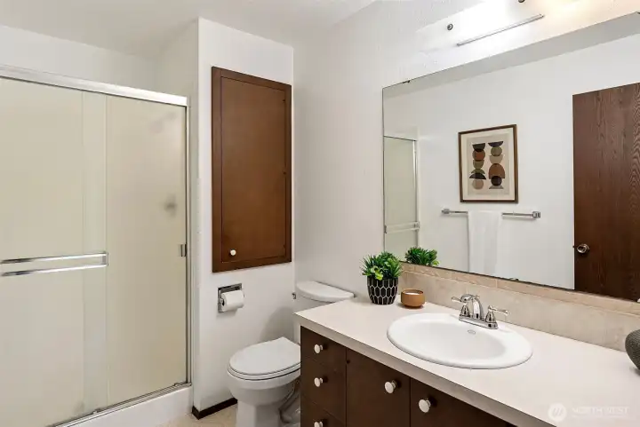 The lower level bathroom has a nice shower and is conveniently located near the lower level bedrooms.