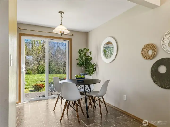 Dining looks out to large back yard