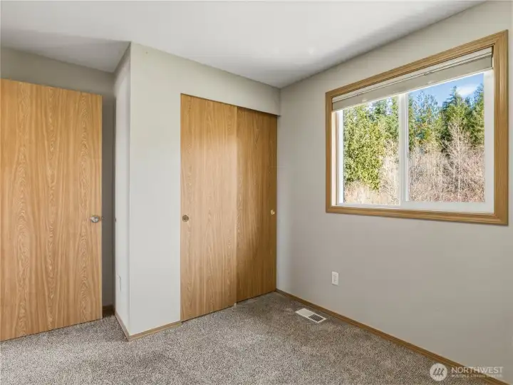 Looks out to beautiful yard