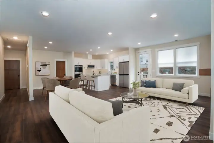 Open great room with 9' ceilings.   Virtually staged.
