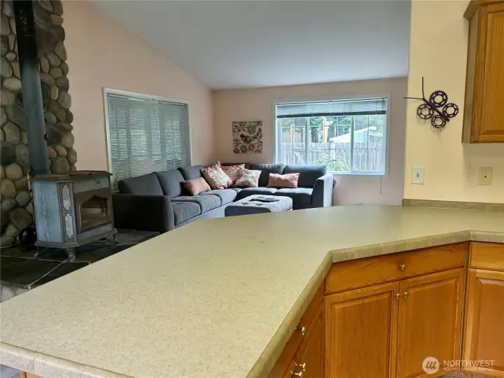 Kitchen counter eating space open nicely to the great room.