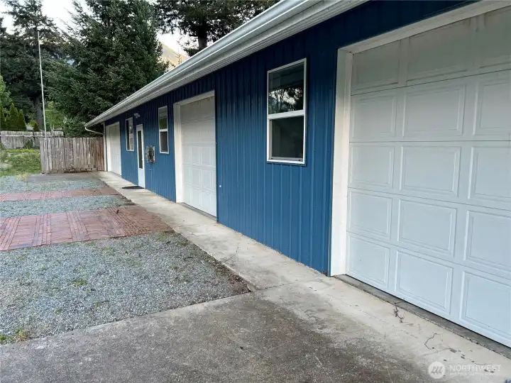 36 x 80 detach garage shop that could house 16 cars. Has 20 and 30 Amp plugs throughout.