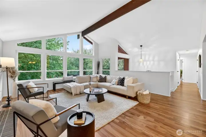 Vaulted ceilings, interior paint, refinished hardwoods.