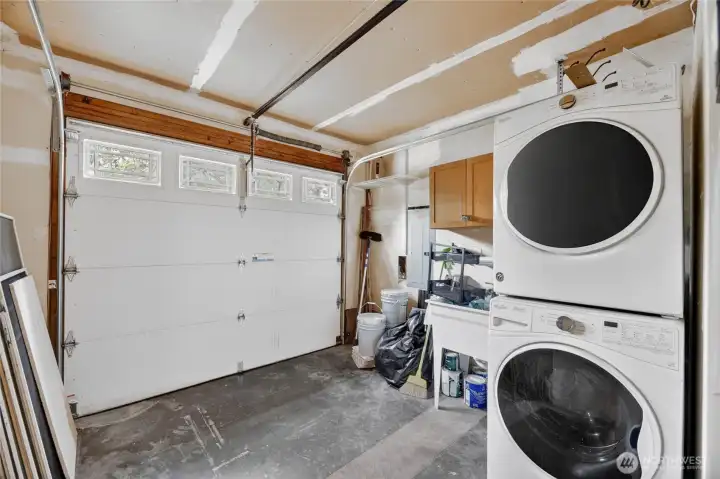 Converted garage space to utility and storage for EV devices. Plus EV charger!