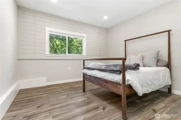 Extra room currently used as bedroom on south side of home