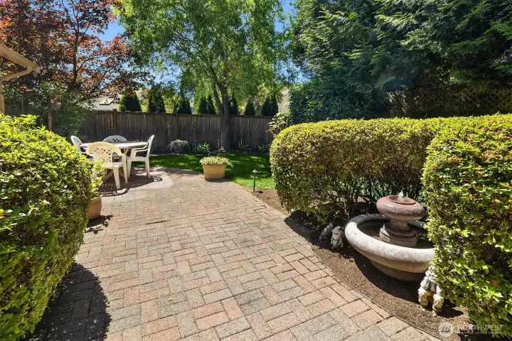 Plenty of back yard space for gatherings and relaxation / Water fountain included