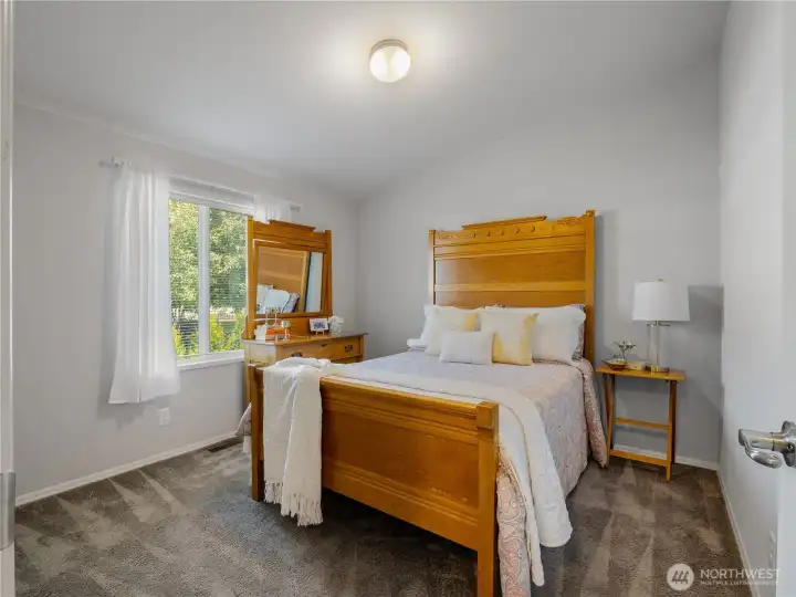 The Primary bedroom has room for a large bed and more.
