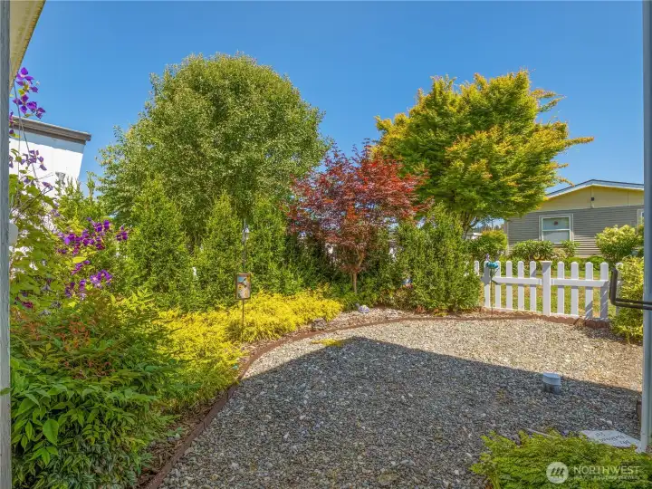 The yard has nice plants that are low maintenance.