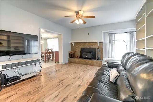 Cozy wood stove in living room.