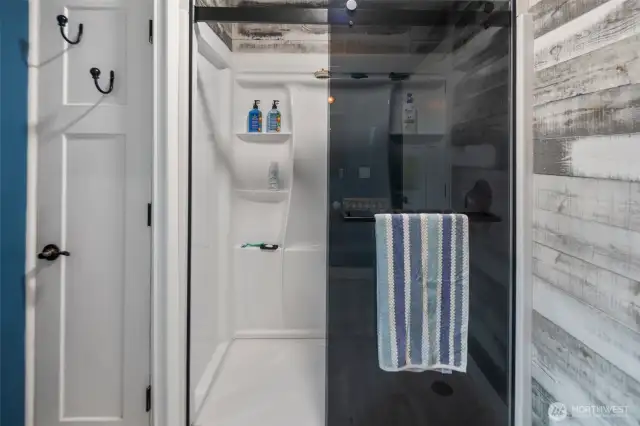 You've also got a beautiful sliding glass door on your shower.